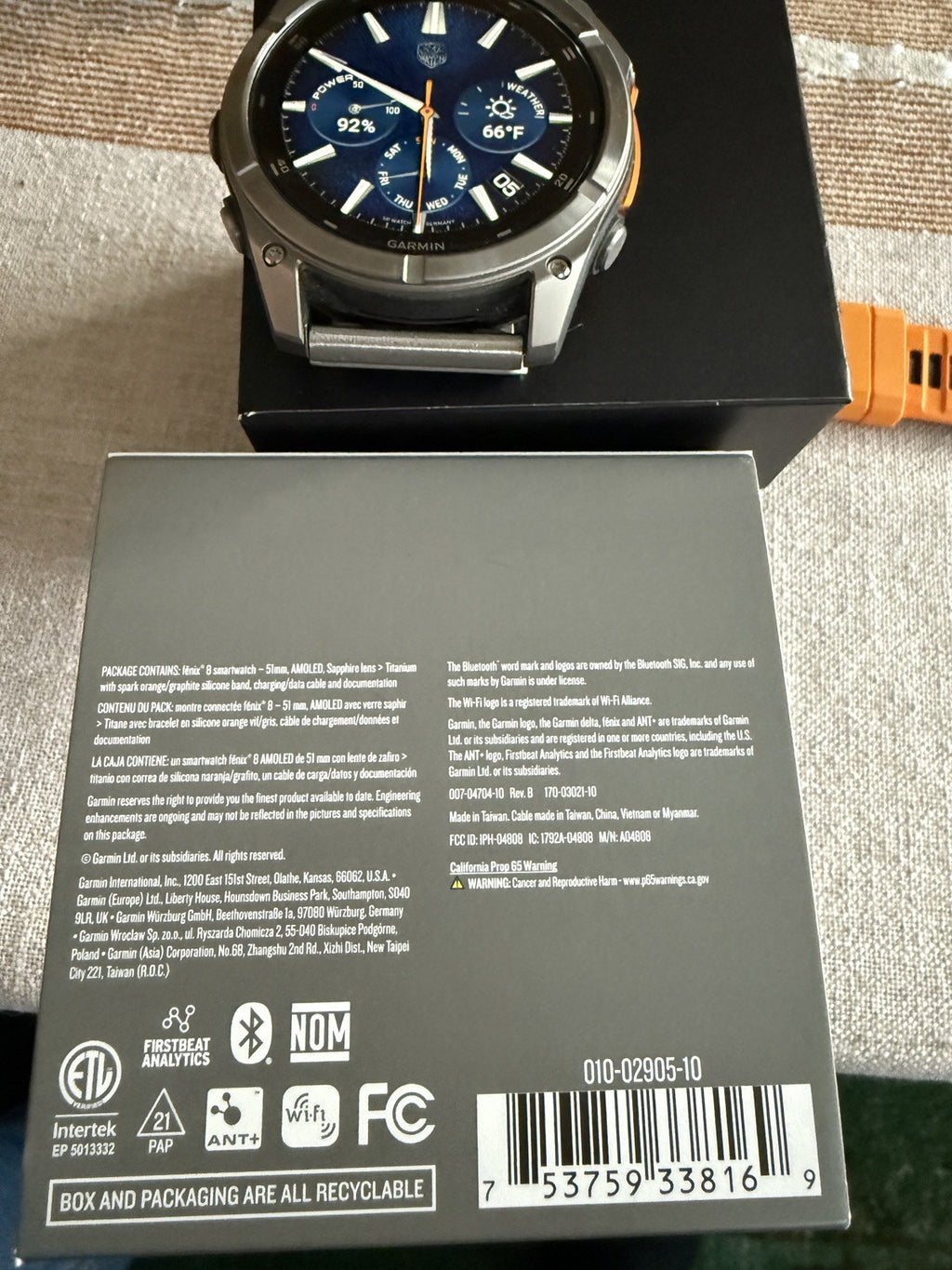 Garmin fenix 8 Amoled Sapphire 51 mm Watch Titanium w Spark Orange Silicone Band