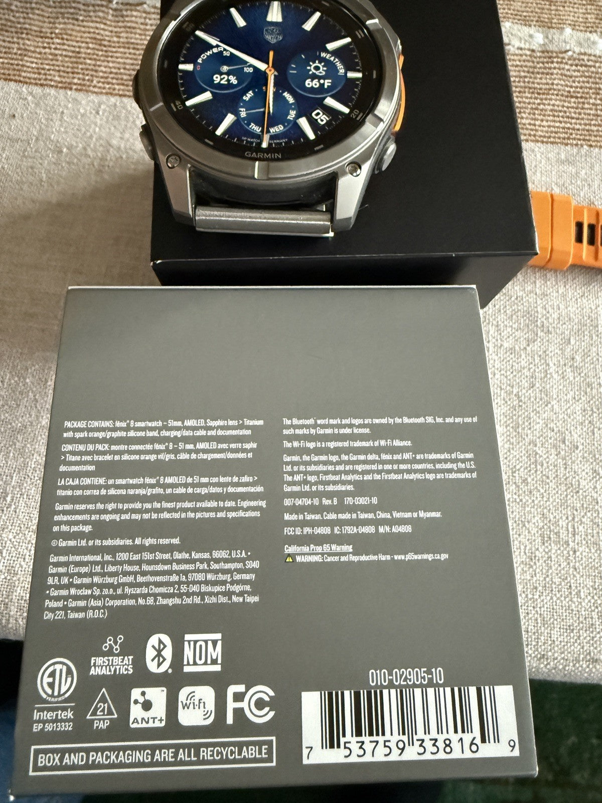 Garmin fenix 8 Amoled Sapphire 51 mm Watch Titanium w Spark Orange Silicone Band