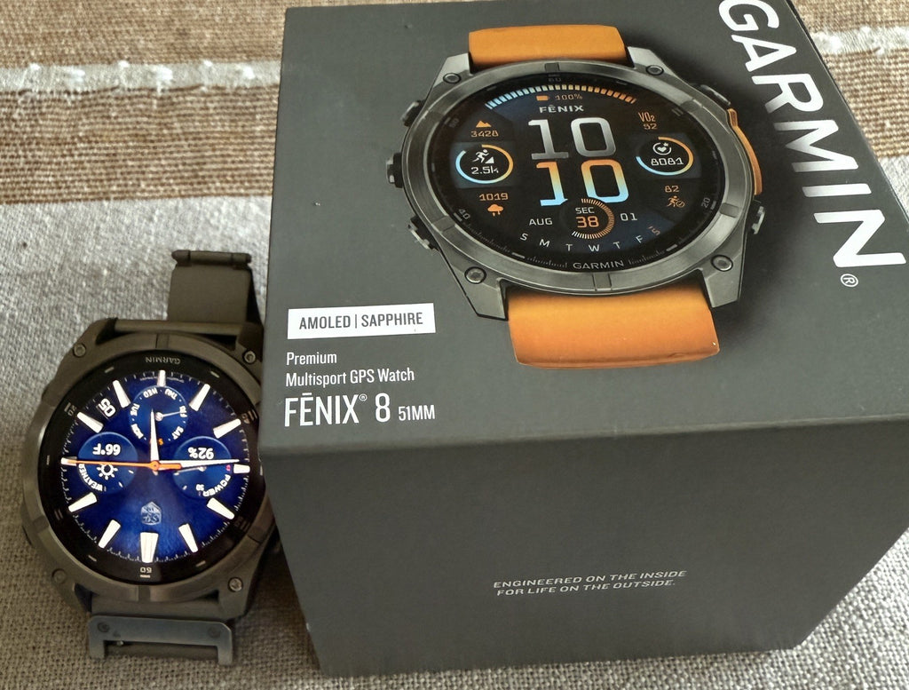 Garmin fenix 8 Amoled Sapphire 51 mm Watch Titanium w Spark Orange Silicone Band
