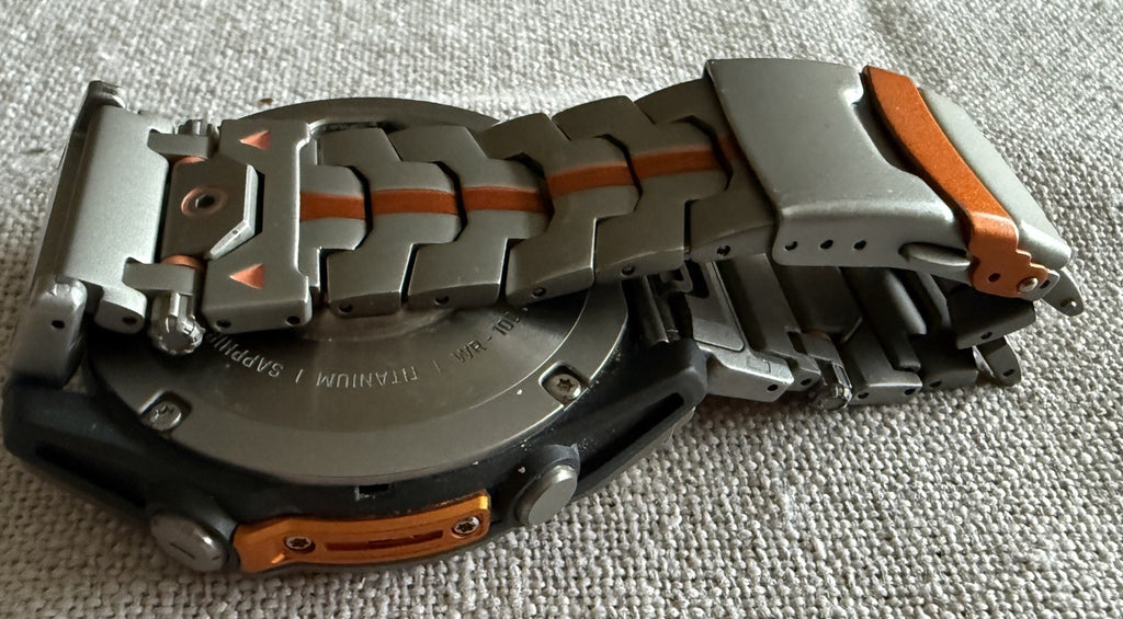 Garmin fenix 8 Amoled Sapphire 51 mm Watch Titanium w Spark Orange Silicone Band