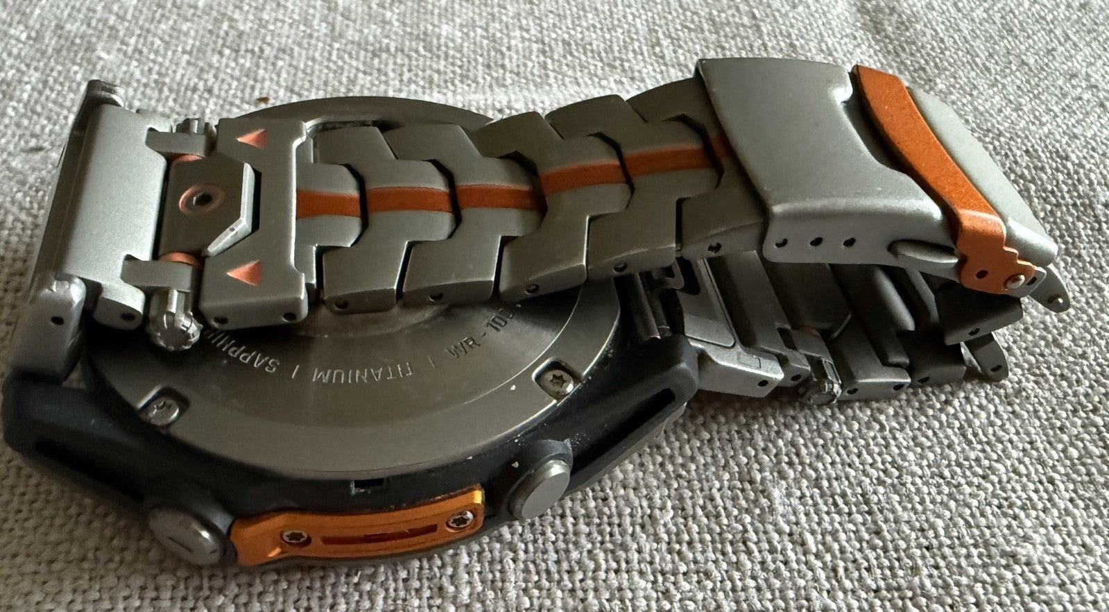 Garmin fenix 8 Amoled Sapphire 51 mm Watch Titanium w Spark Orange Silicone Band