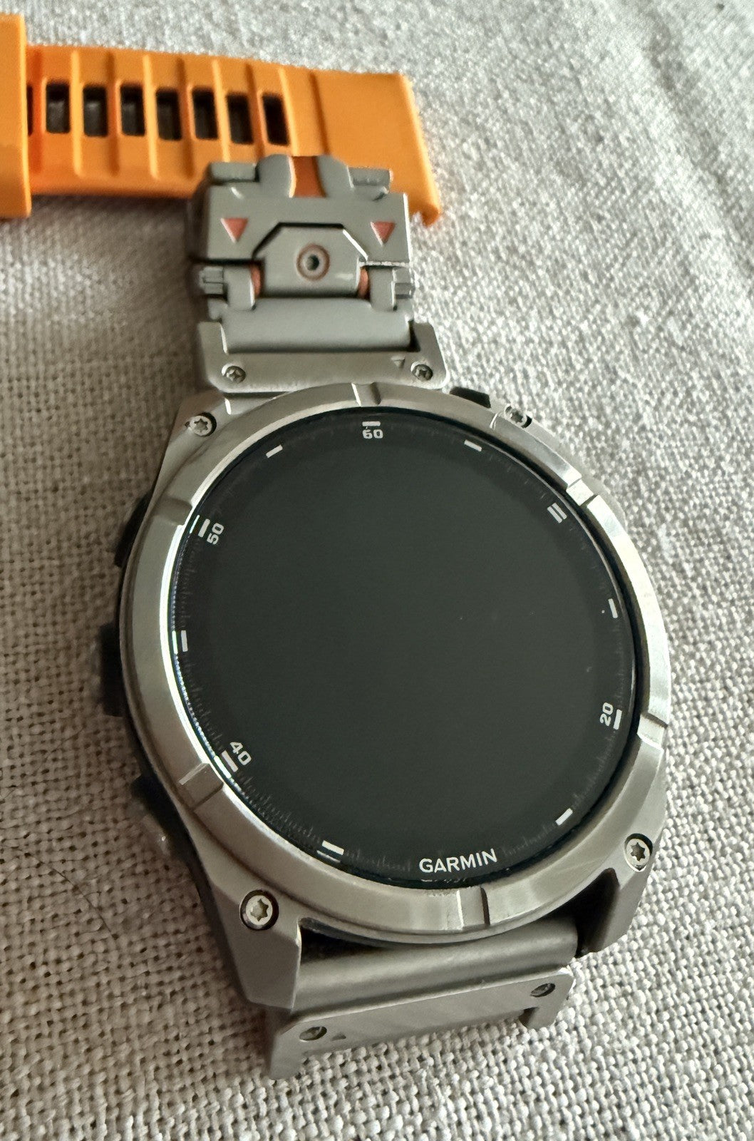 Garmin fenix 8 Amoled Sapphire 51 mm Watch Titanium w Spark Orange Silicone Band