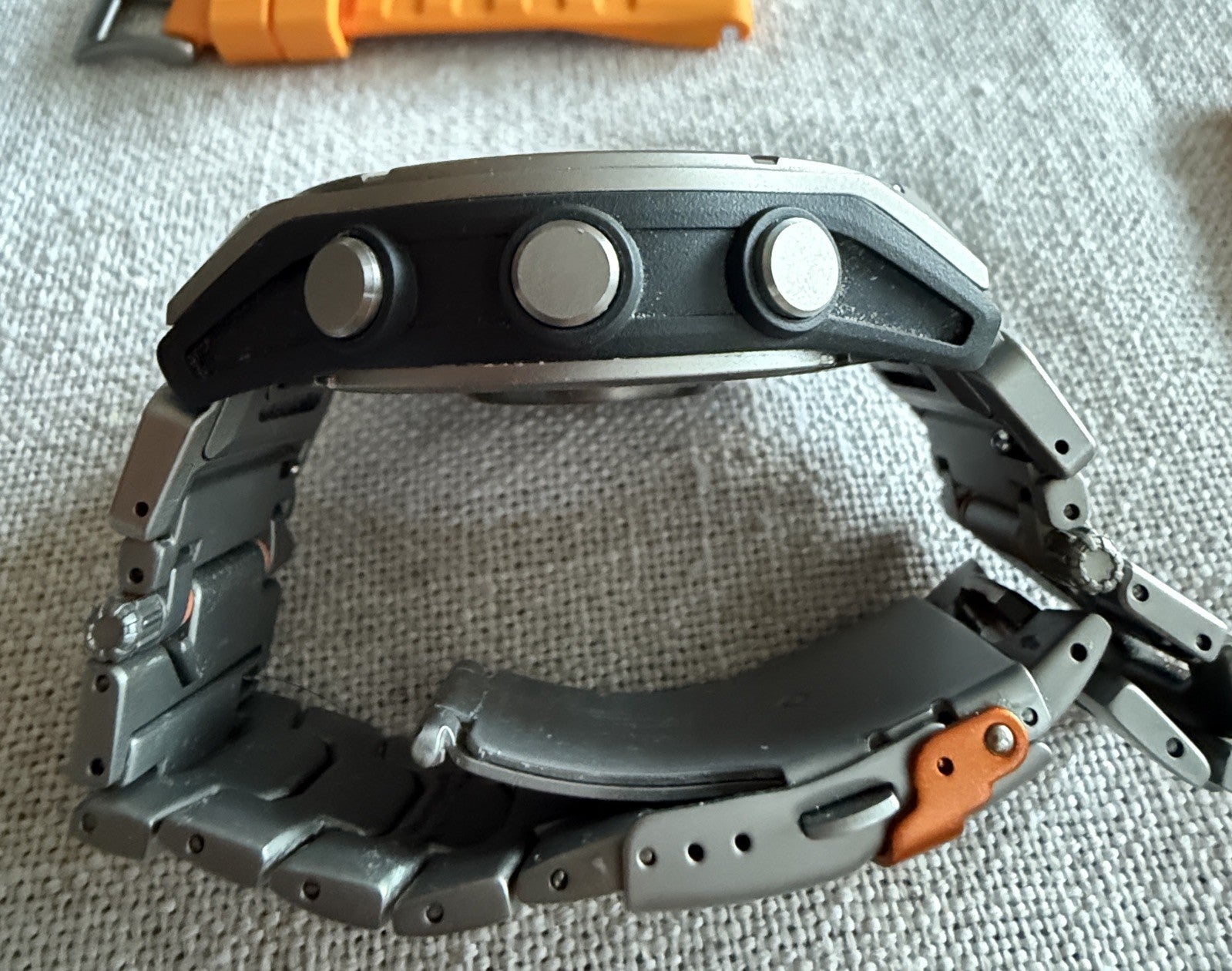 Garmin fenix 8 Amoled Sapphire 51 mm Watch Titanium w Spark Orange Silicone Band